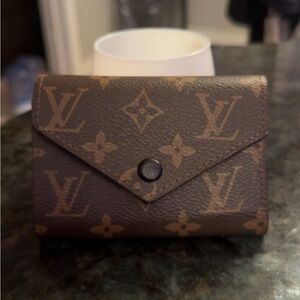 Louis Vuitton Black Leather Bi-Fold Card Wallet